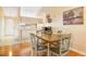 Bright dining area with wood table and chairs near kitchen at 1098 Soria Ave, Orlando, FL 32807