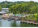 Community pool, boat docks, and waterfront property at 1140 S Orlando Ave # J6, Maitland, FL 32751