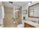 Updated bathroom with a walk-in shower, toilet and vanity at 1140 S Orlando Ave # J6, Maitland, FL 32751