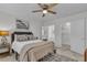 Bright bedroom with a queen bed, closet and ensuite bath at 1140 S Orlando Ave # J6, Maitland, FL 32751