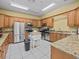 Modern kitchen with stainless steel appliances at 1140 S Orlando Ave # J6, Maitland, FL 32751