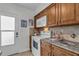 Cozy kitchen area featuring modern appliances and ample counter space, perfect for culinary creations at 1140 S Orlando Ave # J6, Maitland, FL 32751