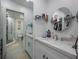 Elegant bathroom with modern vanity and walk-in shower at 13427 Blue Heron Beach Dr # 1001, Orlando, FL 32821