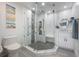 Modern bathroom with walk-in shower and white vanity at 13427 Blue Heron Beach Dr # 1001, Orlando, FL 32821