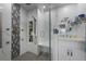 Elegant bathroom featuring a large walk-in shower at 13427 Blue Heron Beach Dr # 1001, Orlando, FL 32821