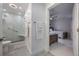 Modern bathroom with a large shower and marble tile at 13427 Blue Heron Beach Dr # 1001, Orlando, FL 32821