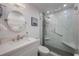 Updated bathroom with a walk-in shower and modern fixtures at 13427 Blue Heron Beach Dr # 1001, Orlando, FL 32821