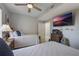 Bedroom with two twin beds and large TV at 13427 Blue Heron Beach Dr # 1001, Orlando, FL 32821