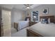 Two twin beds in a well-lit bedroom with balcony access at 13427 Blue Heron Beach Dr # 1001, Orlando, FL 32821