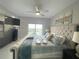 Main bedroom with large bed, city view, and ample natural light at 13427 Blue Heron Beach Dr # 1001, Orlando, FL 32821