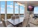 Elegant dining area with lake views at 13427 Blue Heron Beach Dr # 1001, Orlando, FL 32821