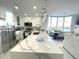 Modern kitchen with quartz countertops and lake views at 13427 Blue Heron Beach Dr # 1001, Orlando, FL 32821