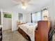 Comfortable bedroom with a queen-size bed and ample closet space at 1350 Winter Green Way, Winter Garden, FL 34787