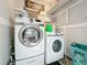 Clean laundry room, equipped with a washer and dryer at 1350 Winter Green Way, Winter Garden, FL 34787