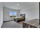 Bedroom with rustic bed frame and a view of the lake from its window at 1551 Gateway Ln, Kissimmee, FL 34746