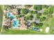 Aerial view showing community pool, playground, parking and clubhouse at 1551 Gateway Ln, Kissimmee, FL 34746