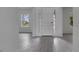 Bright and airy entryway with tile floors and an open floor plan at 1551 Gateway Ln, Kissimmee, FL 34746