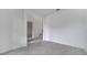 Open hallway with tile floors and views of a staircase and living areas at 1551 Gateway Ln, Kissimmee, FL 34746