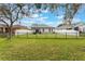 Private backyard with fenced enclosure and lush lawn at 1698 Riveredge Rd, Oviedo, FL 32766