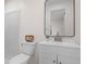 Clean bathroom featuring a modern vanity and mirror at 1703 E Fern Rd, Lakeland, FL 33801