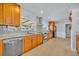 Updated kitchen featuring stainless steel appliances and wood cabinetry at 2127 Lake Dr, Winter Park, FL 32789