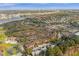 Aerial view of community with city skyline in the distance at 2536 Lemon Tree Ln, Orlando, FL 32839