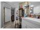 Bathroom with double vanity and mirrored closet at 2536 Lemon Tree Ln, Orlando, FL 32839