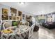 Bright dining area with a round table and eclectic decor at 2536 Lemon Tree Ln, Orlando, FL 32839