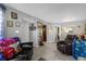 Living room with leather furniture and tiled floors at 2536 Lemon Tree Ln, Orlando, FL 32839