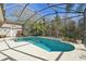 Refreshing pool with screened enclosure and a spacious patio at 2647 Aloma Oaks Dr, Oviedo, FL 32765