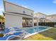 Private backyard oasis with a refreshing pool and patio at 266 Southfield St, Kissimmee, FL 34747