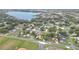 House location shown in wide aerial view near a lake at 2661 Ames Haven Rd, Kissimmee, FL 34744