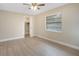 Spacious bedroom with neutral walls and vinyl flooring at 2661 Ames Haven Rd, Kissimmee, FL 34744