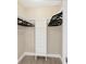 Walk-in closet with hanging rods and shelving at 2661 Ames Haven Rd, Kissimmee, FL 34744