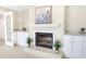 Fireplace with white mantel and built-in shelving at 2661 Ames Haven Rd, Kissimmee, FL 34744