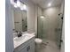 Bathroom showcasing glass shower, modern fixtures, and a sleek vanity at 2753 Redblush Ter, St Cloud, FL 34772