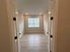 Bright bedroom with wood floors and a window providing plenty of natural light at 2753 Redblush Ter, St Cloud, FL 34772