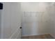 Bright walk-in closet featuring wire shelving and a light wood floor at 2753 Redblush Ter, St Cloud, FL 34772