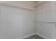 Spacious walk-in closet with wire shelving at 2753 Redblush Ter, St Cloud, FL 34772