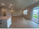 Open-concept living area with sliding glass doors leading to an outdoor patio at 2753 Redblush Ter, St Cloud, FL 34772