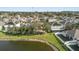 Aerial view of house and neighborhood near lake at 2760 Curpin Ln, Orlando, FL 32825