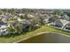 Aerial view of house and neighborhood near lake at 2760 Curpin Ln, Orlando, FL 32825