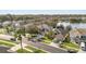 Aerial view of a residential neighborhood near a lake at 2760 Curpin Ln, Orlando, FL 32825