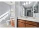 Bright bathroom featuring a vanity with a quartz countertop at 2760 Curpin Ln, Orlando, FL 32825