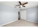 Bright bedroom with double door closet and ceiling fan at 2760 Curpin Ln, Orlando, FL 32825