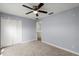 Bedroom with double door closet and ceiling fan at 2760 Curpin Ln, Orlando, FL 32825