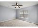 Well-lit bedroom featuring a ceiling fan and window blinds at 2760 Curpin Ln, Orlando, FL 32825