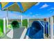 Dual water slides with green and blue tubes at 2821 Almaton Loop # 303, Kissimmee, FL 34747