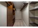 Large walk-in closet with shelving and hanging rods at 3511 Exeter Ct, Orlando, FL 32812