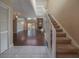 Entryway with tiled floor, stairs to the second floor and access to the living room at 3511 Exeter Ct, Orlando, FL 32812